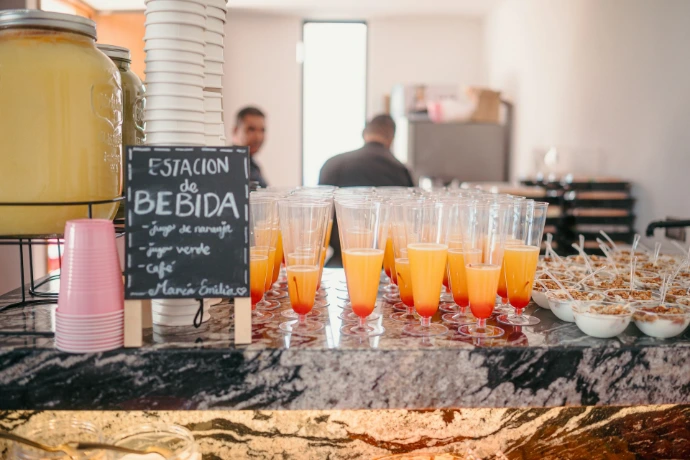 Orange juice and drinks on a counter